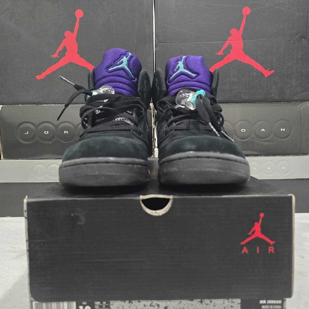 This is a Nike Air Jordan 5 Retro "Black Grape" sneaker. 